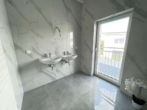 Bild - Exklusives Einfamilienhaus mit Gartenidylle & moderner Architektur – in begehrter Lage Strasshof