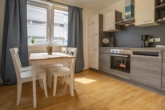 Bild - Neubau: Attraktive Anlegerwohnung mit großem Garten
